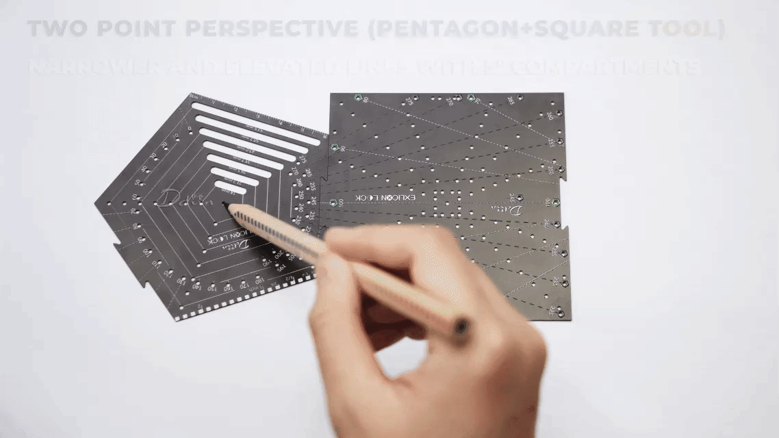 Demonstration on drawing two point perspective with black pentagon tool and black square tool on white paper