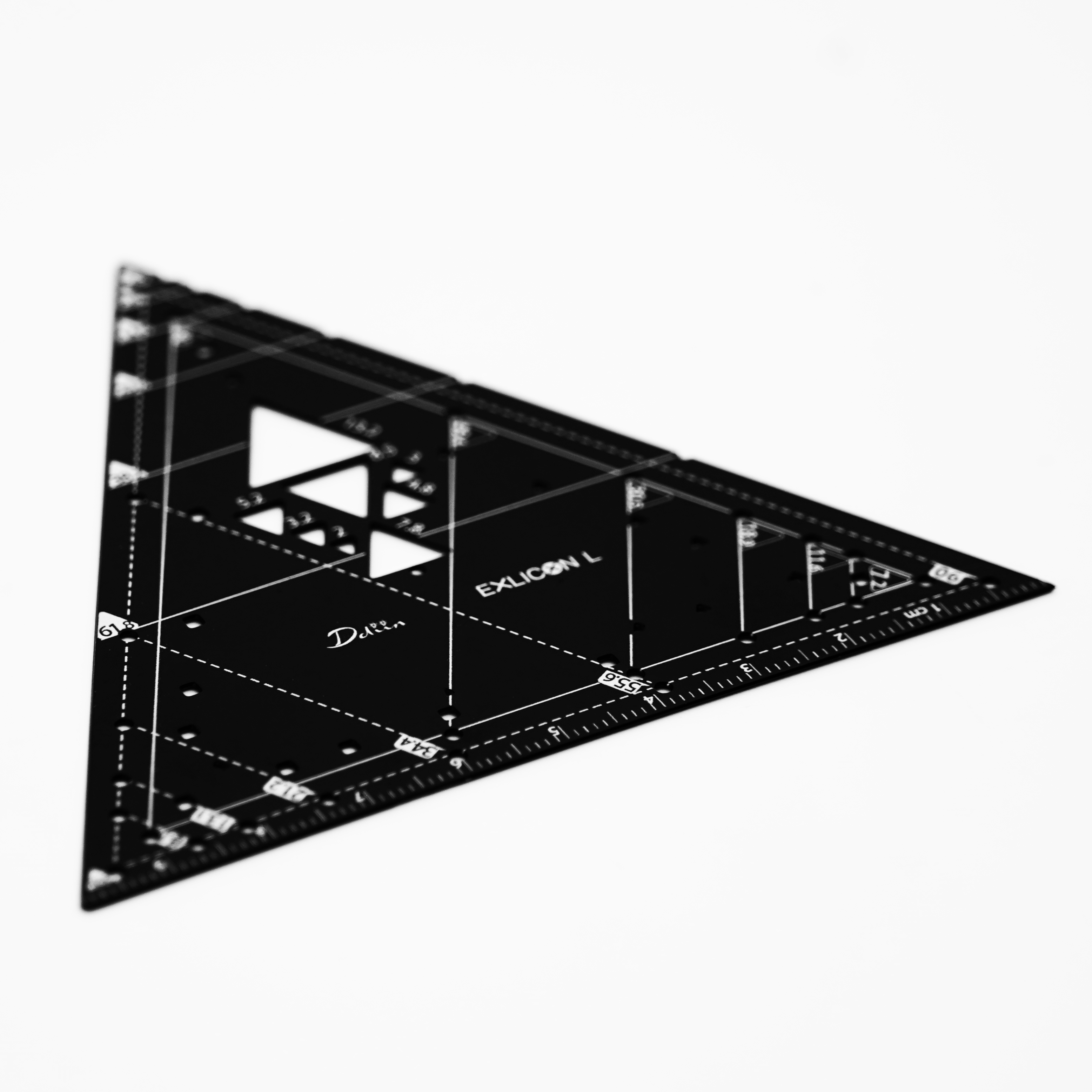 Black triangle compass with measurement markings for perfect golden ratio