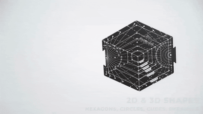 Demonstration of drawing 2D and 3D shapes using black hexagon tool with measurement markings on white paper