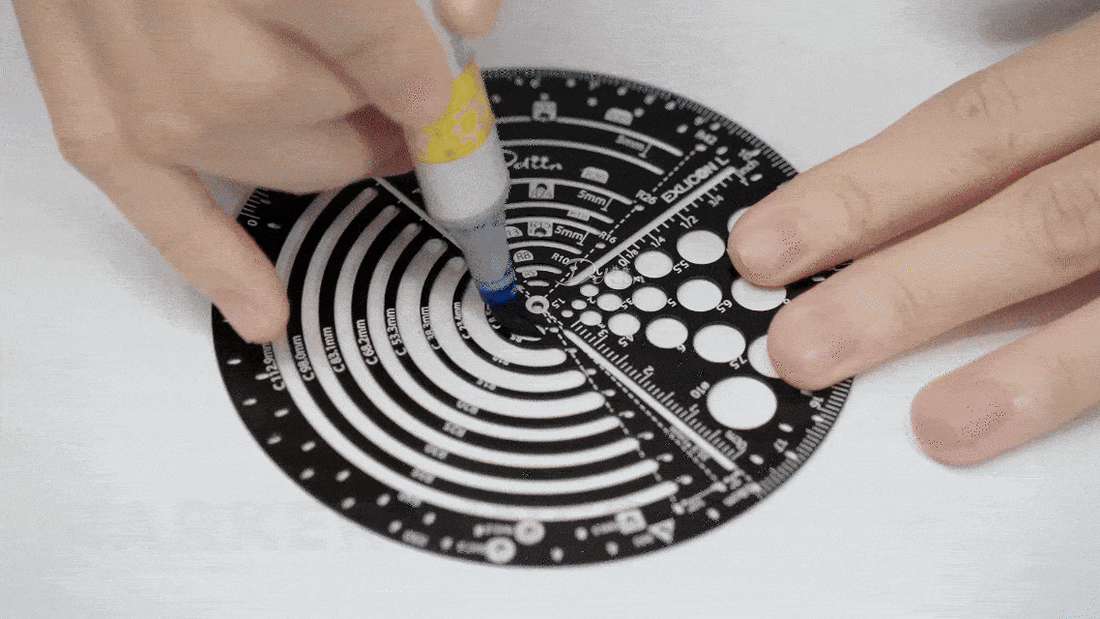 Demonstration on drawing different thicknesses of lines with black circular compass