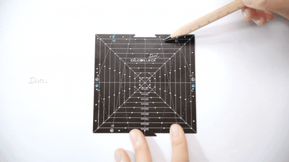 Demonstration of drawing octagons with black square tool with measurement markings